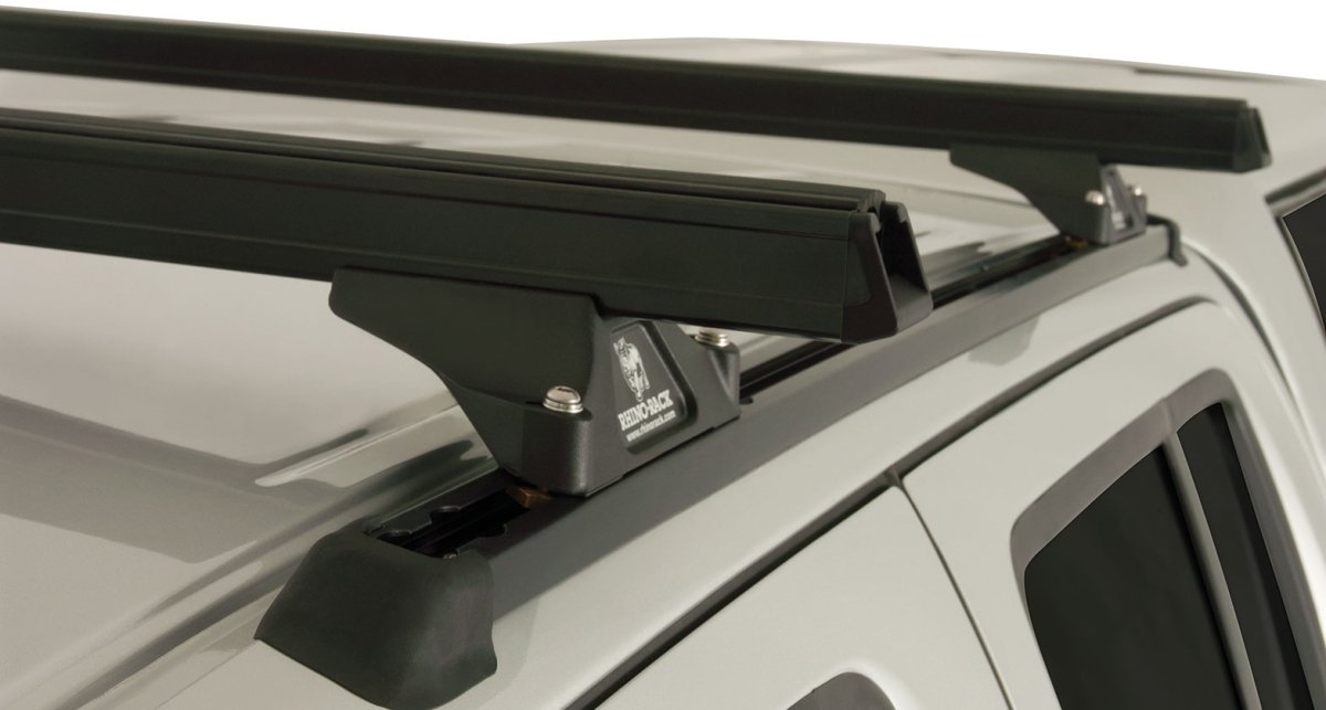 Kit 2 barres de toit noire 1375mm Heavy Duty RLTP Trackmount Nissan Navara D40 2005-2015 - RHINO-RACK - Nissan Navara D40