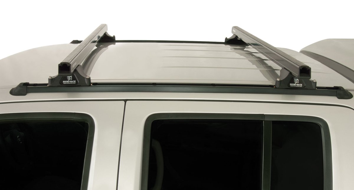 Kit 2 barres de toit noire 1375mm Heavy Duty RLTP Trackmount Nissan Navara D40 2005-2015 - RHINO-RACK - Nissan Navara D40