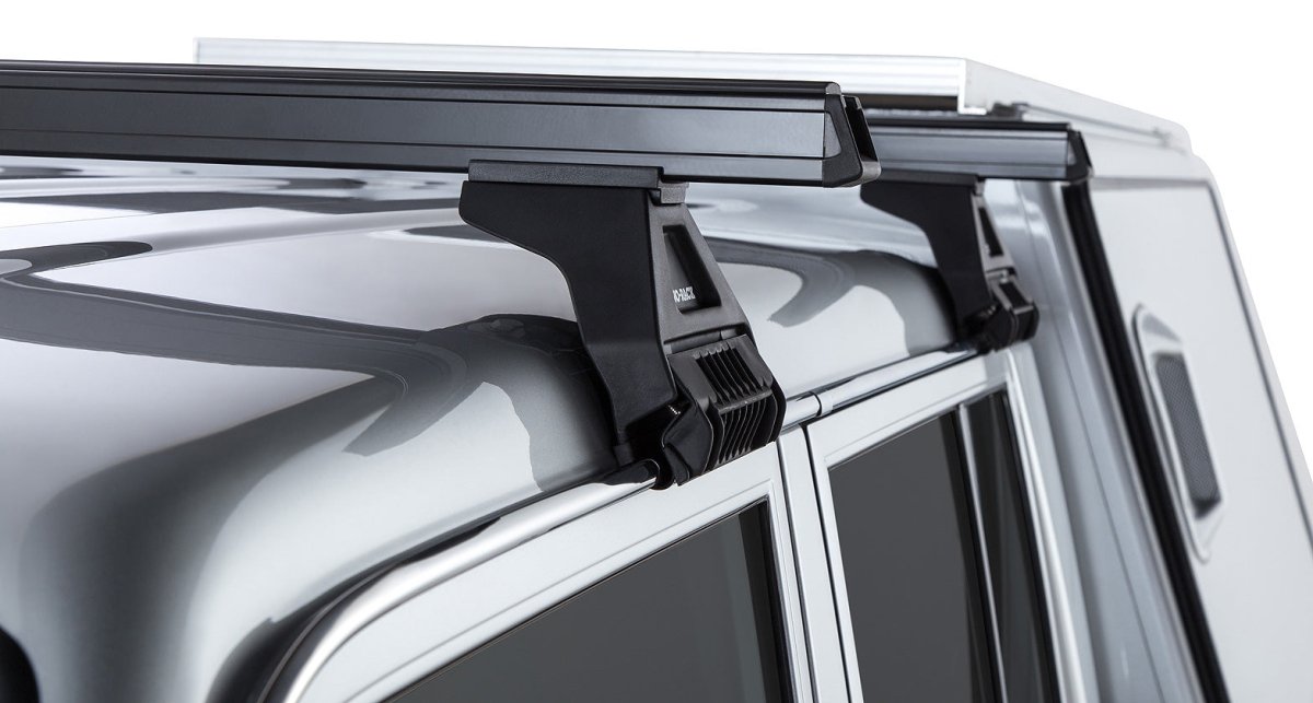Kit 2 barres de toit noire Heavy Duty 1500mm avec pieds RL110 Toyota Land Cruiser série 79 2007+ - RHINO-RACK - Toyota Land Cruiser 78/79