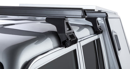 Kit 2 barres de toit noire Heavy Duty 1500mm avec pieds RL110 Toyota Land Cruiser série 79 2007+ - RHINO-RACK - Toyota Land Cruiser 78/79