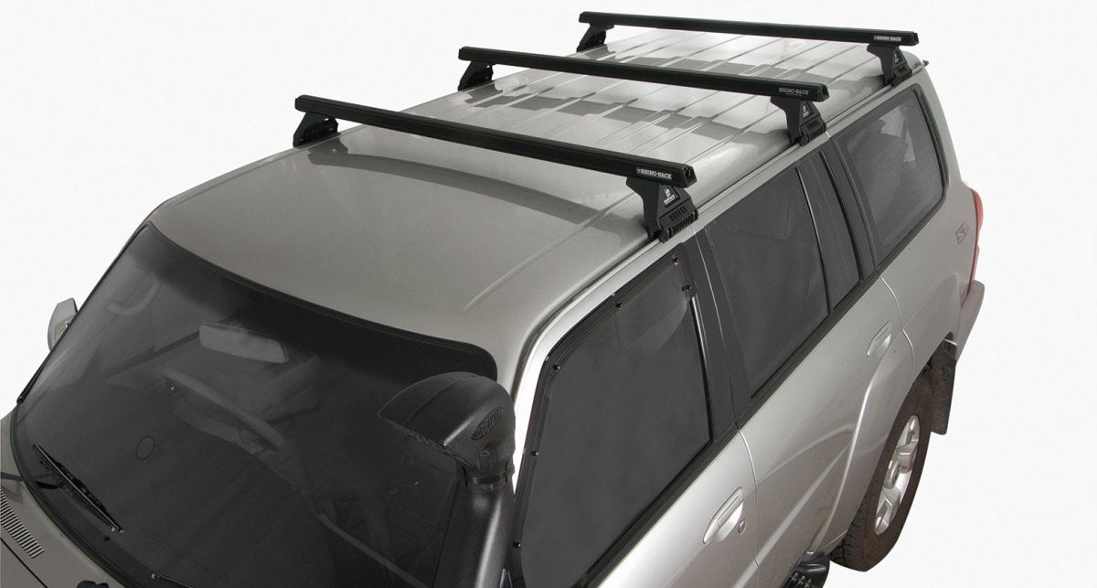 Kit 3 barres de toit noire 1375mm Heavy Duty RL110 Trackmount Nissan Patrol GU Y61 1997-2017 - RHINO-RACK -