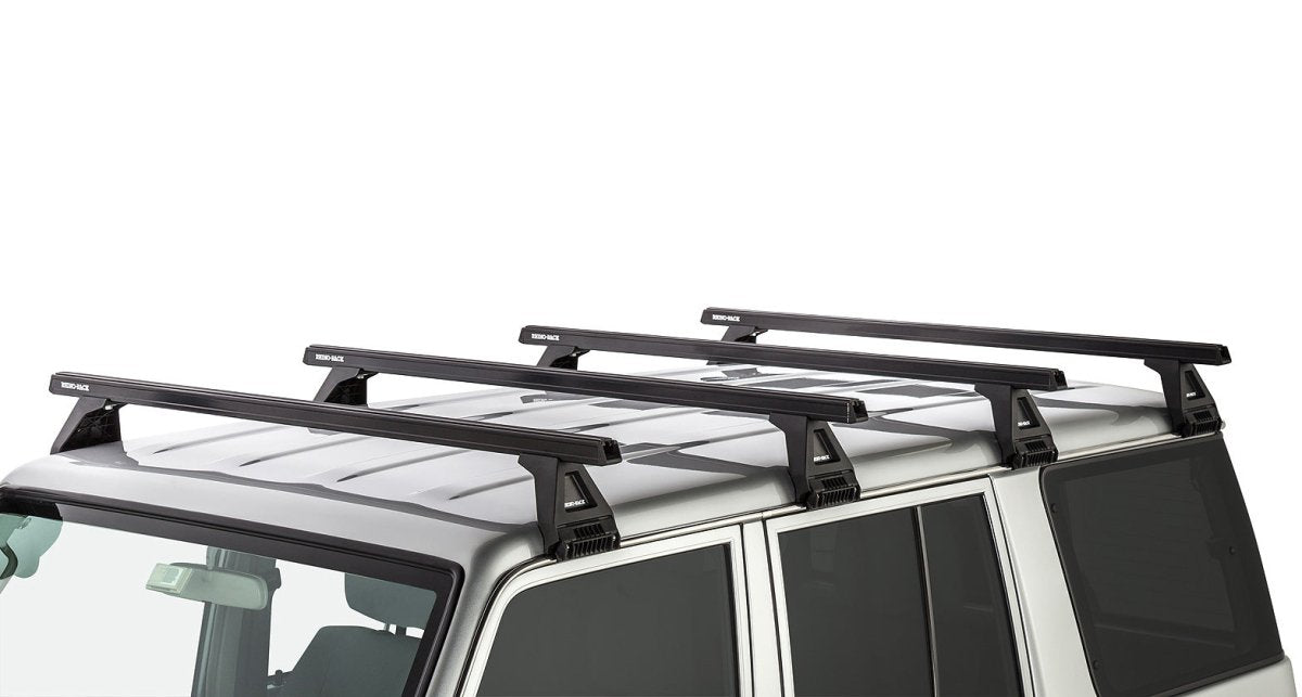 Kit 4 barres de toit noire Heavy Duty 1500mm avec pieds RL150 Toyota Land Cruiser série 76 2007+ - RHINO-RACK - Toyota 70 Series